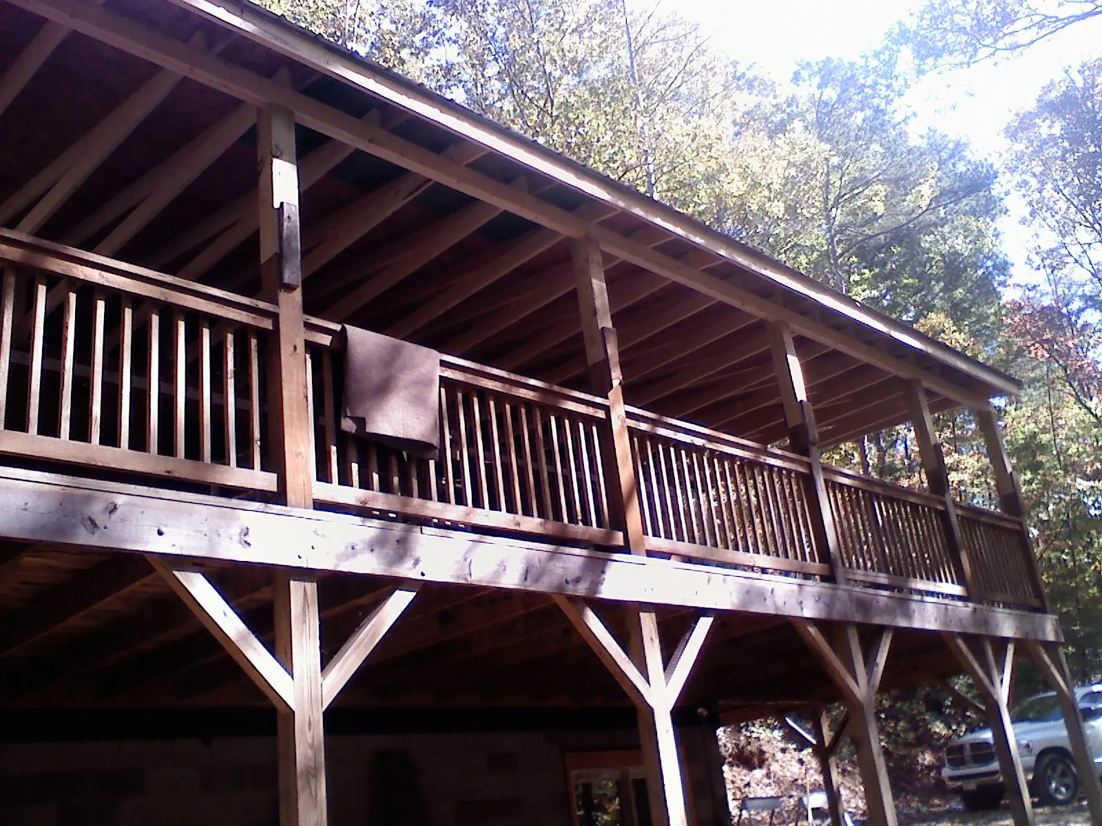 Timber framing under a new elevated porch and deck — Roof Leak Repair in Conifer by Roofing Brothers